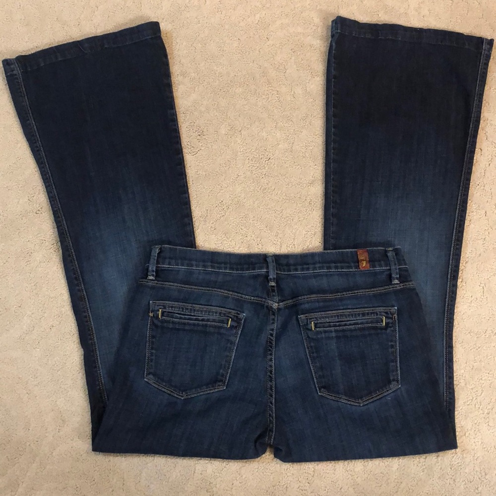 7 for all mankind jeans w/flare bottom, button fly slight wiskering, fall season